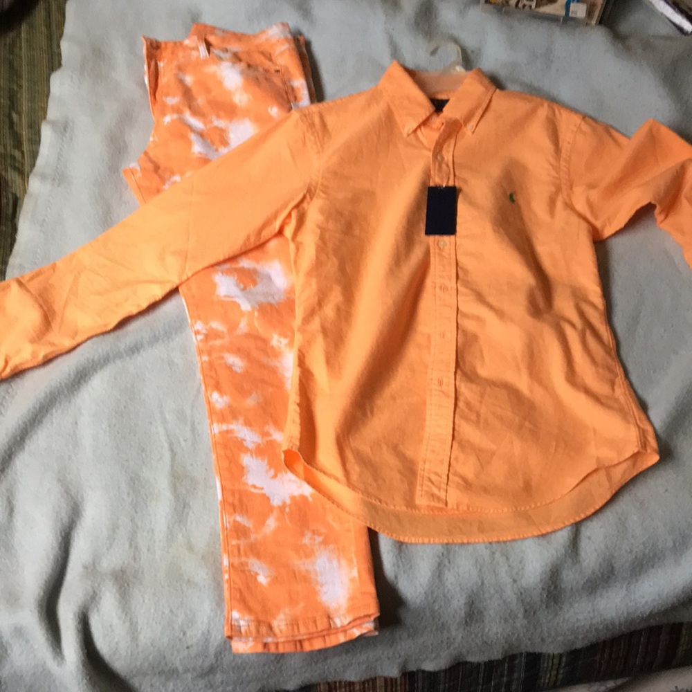 I have a size 34 pants. Never been worn. With a raph Lauren large slim fit shirt